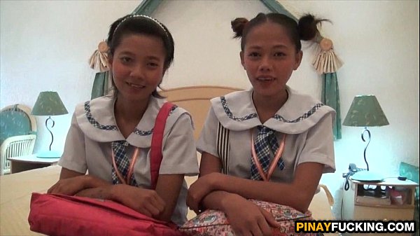 Two Asian Amateur Cuties Sharing A White Dick